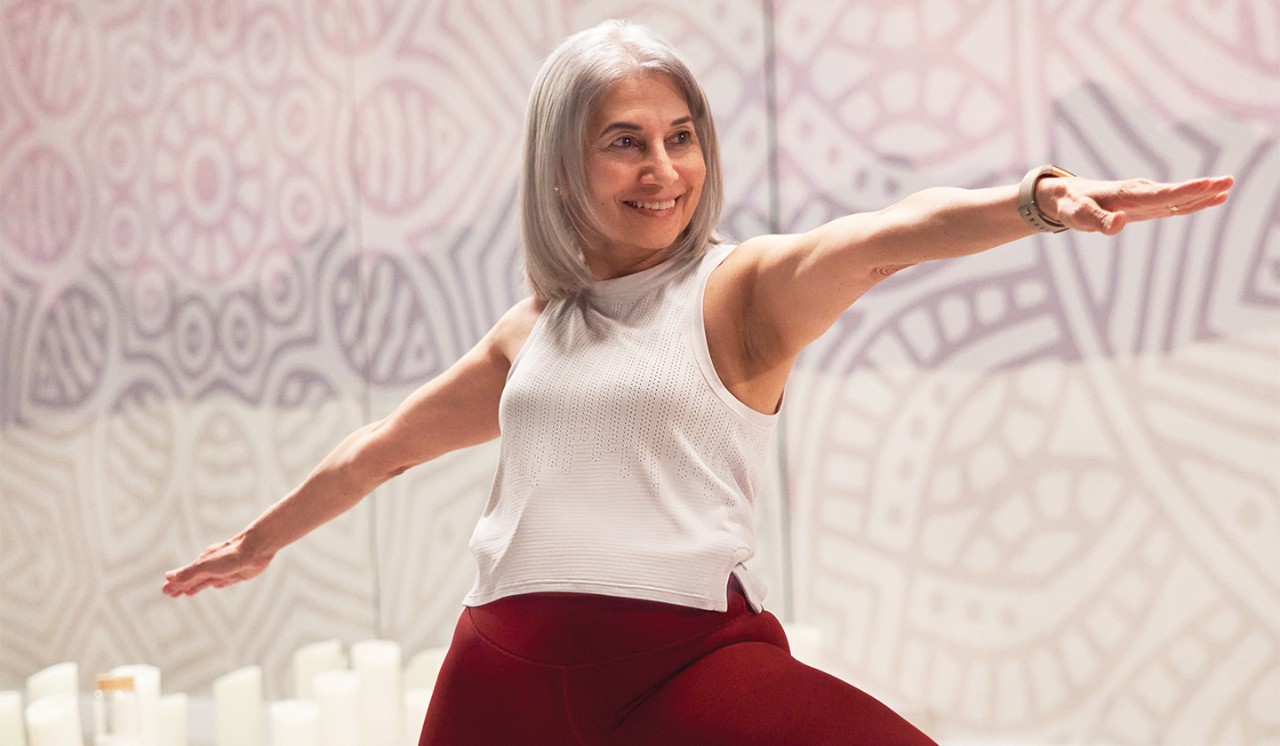 A GoodLife Fitness member participates in a yoga class.