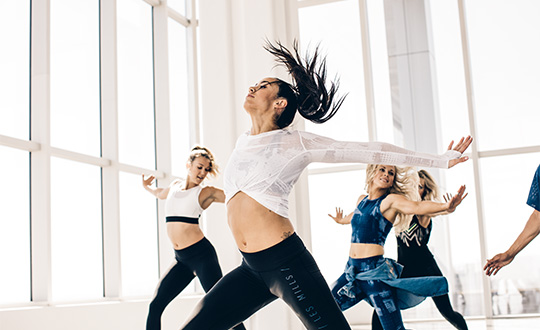 Four women in a dance class