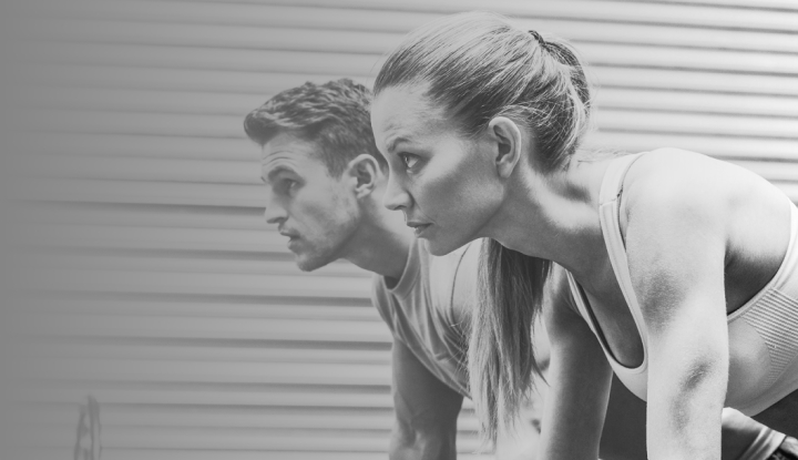 Man and woman side by side, looking forward